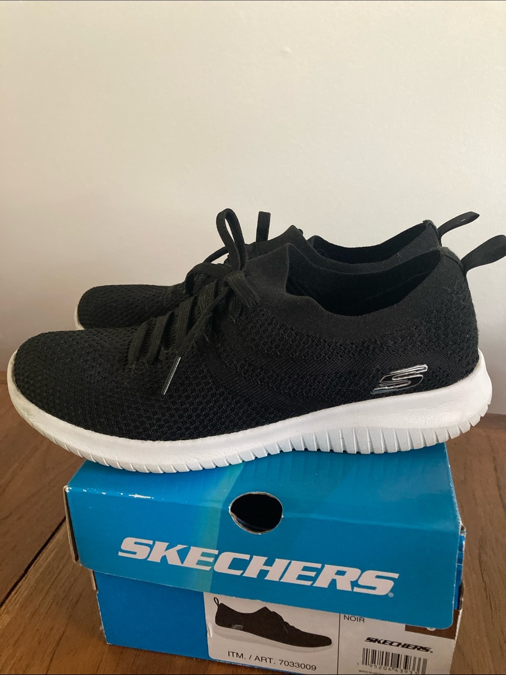 Skechers Black Knit Slip-On Sneakers with White Sole